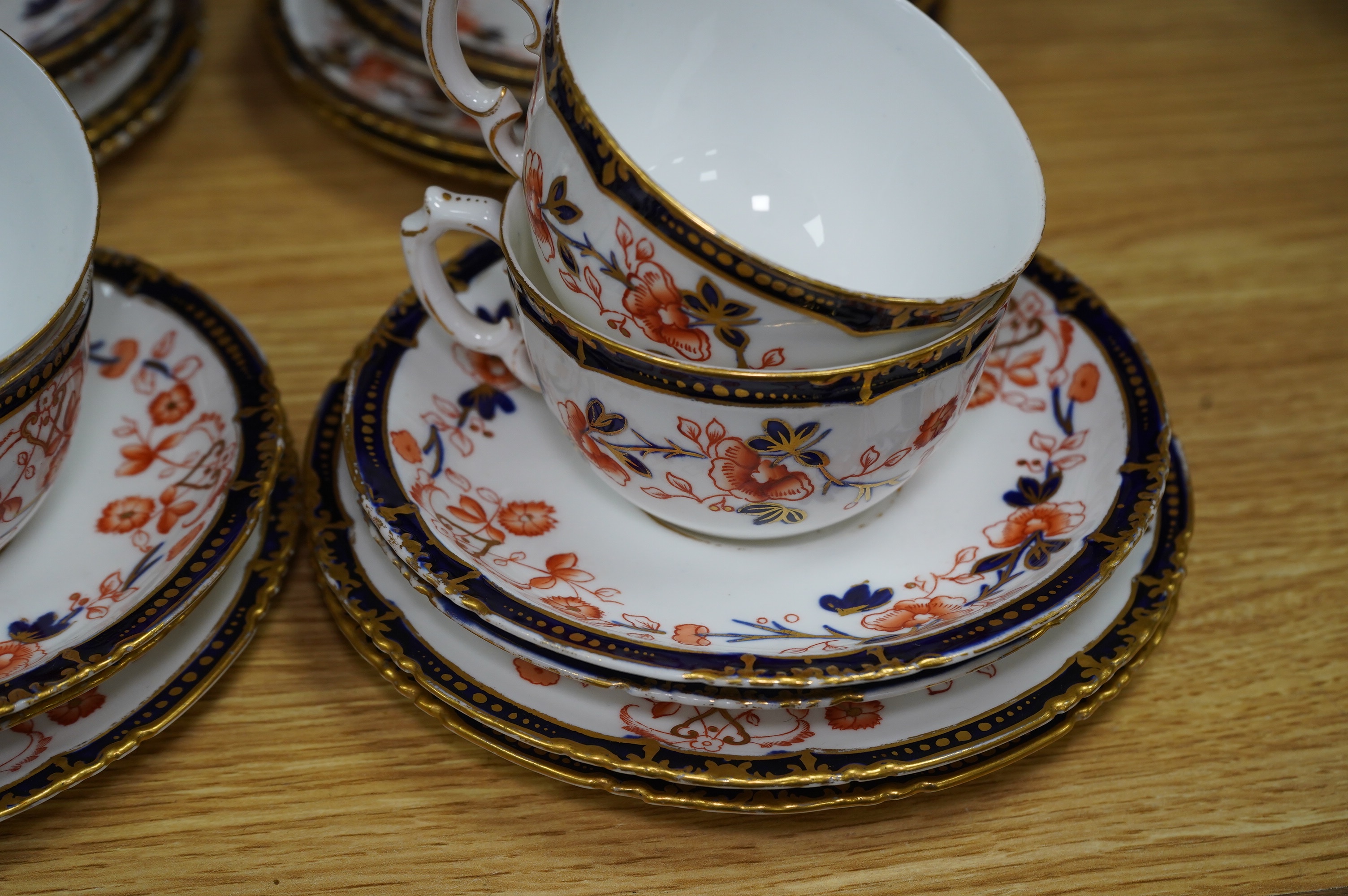 A Royal Crown Derby Imari porcelain part tea set to include sandwich plates, trios and milk jug. Condition - varies, some breaks